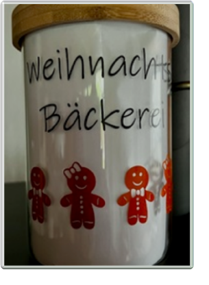 Glasbehälter mit Holzdeckel und Text: Weihnachtsbäckerei